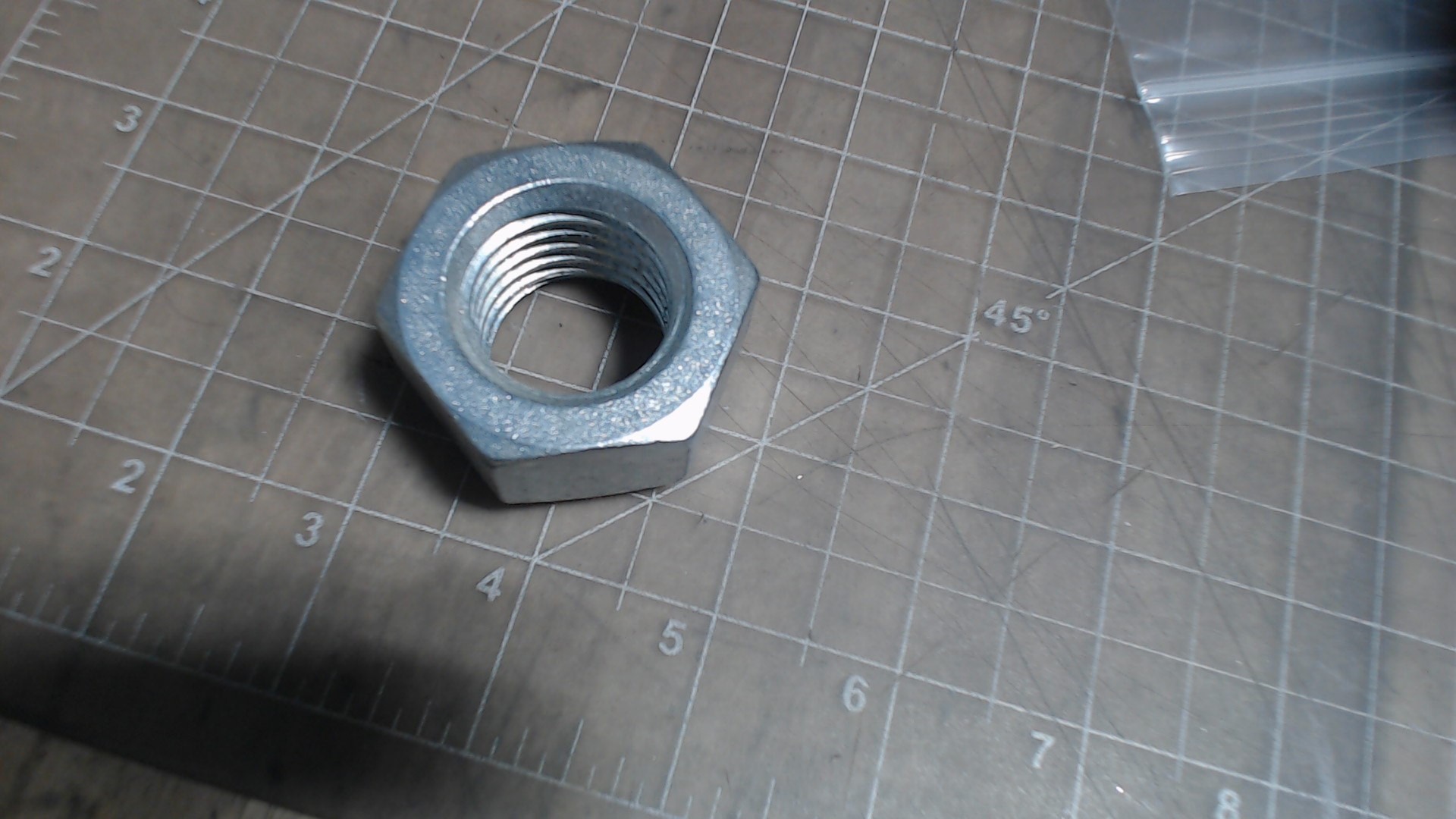 Nut 1 1/8 7 SLFLKG - Fastener